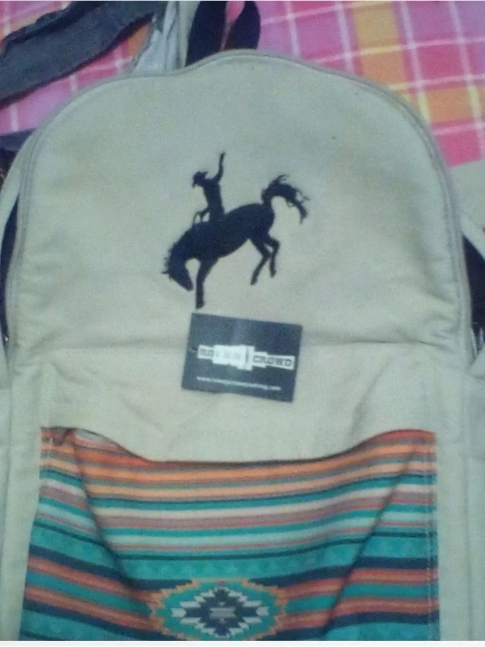 Cream colored Rowdy Crowd backpack NWT has Turquoise Patterned Front Pocket